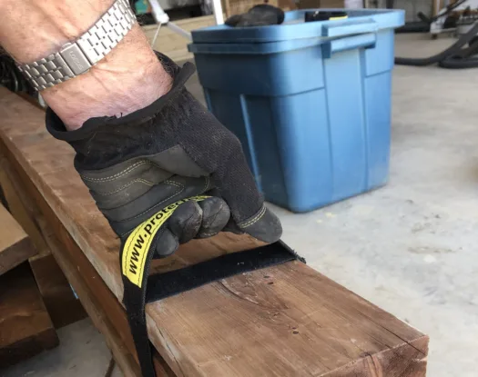 Carrying a stack of lumber with a Handy Handle
