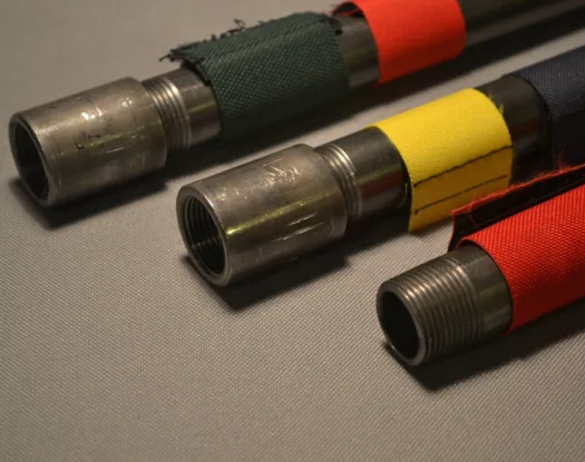 Close-up of colour markers on steel pipe