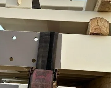 Strap saver protecting a strap at the corner of a load