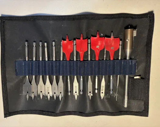 Drill bit holder with spade bits