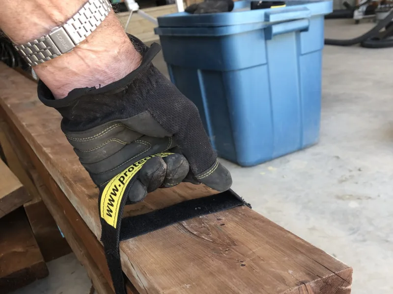 Carrying a stack of lumber with a Handy Handle