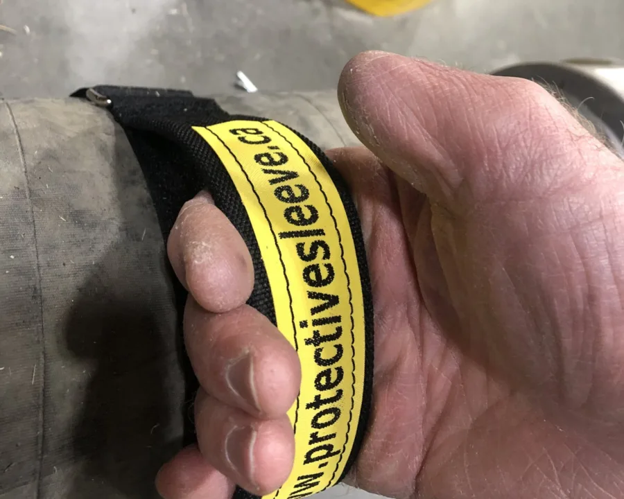 Lifting a large hose by its Handy Handle