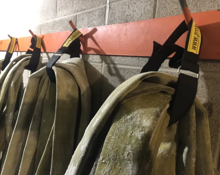 Hoses hung for storage by their Handy Handles