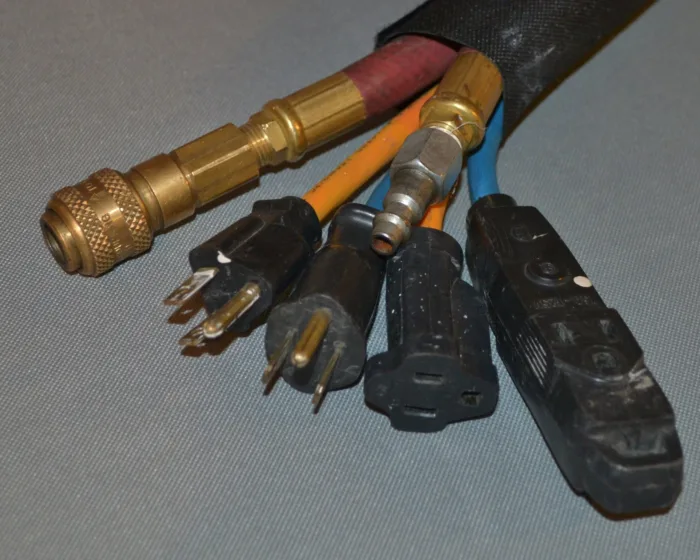 Sleeve bundling air lines and power cords