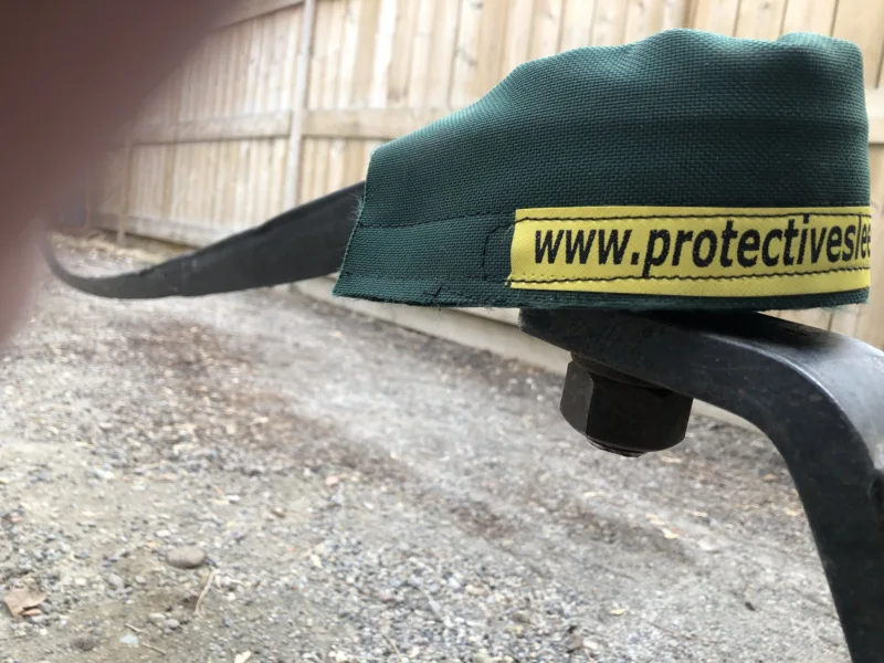 Strap saver protecting a tow strap at the hitch
