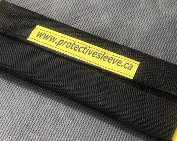 Strap saver on a yellow load strap