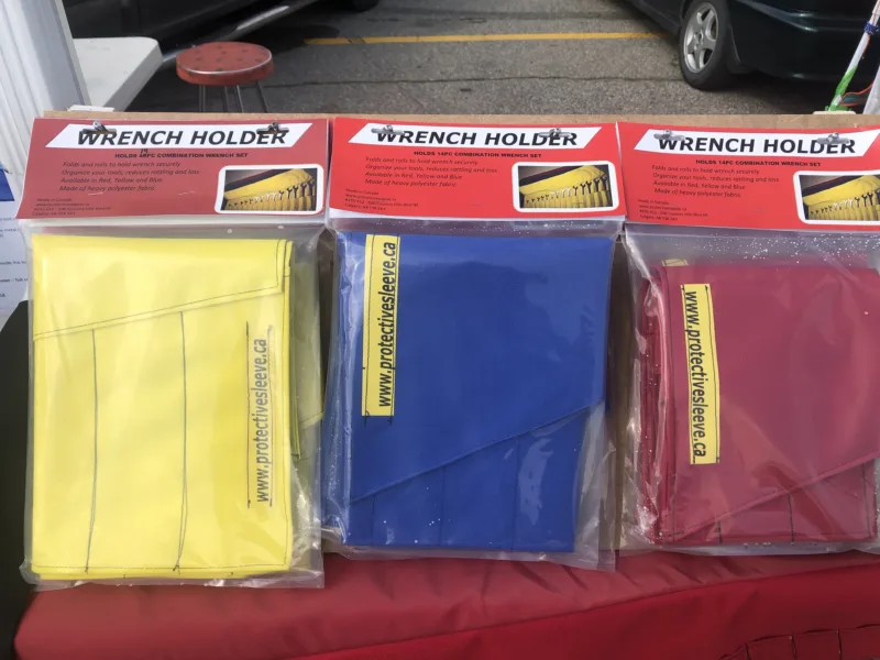 Wrench holders packaged in yellow, blue and red