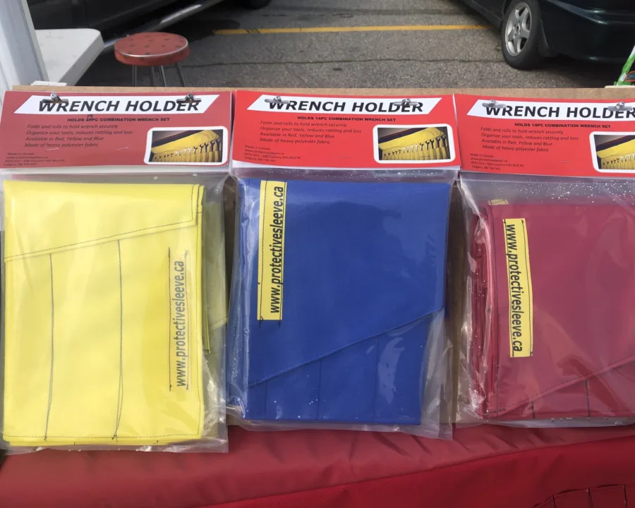 Wrench holders packaged in yellow, blue and red